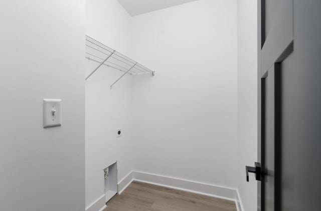 9 Walnut St, Fishersville, VA 22939 - laundry room featuring electric dryer hookup, wood finished floors, and baseboards