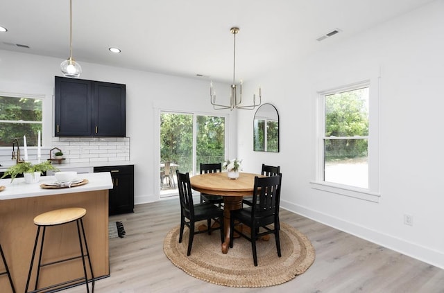 9 Walnut St, Fishersville, VA 22939 - dining room with healthy amount of natural light, light wood-style flooring, and recessed lighting