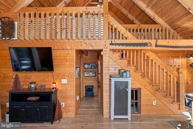 248 Wintergreen Dr, Luray, VA 22835 - living room featuring wood ceiling, wood walls, high vaulted ceiling, beamed ceiling, and hardwood / wood-style floors