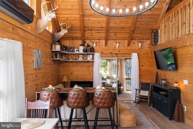 248 Wintergreen Dr, Luray, VA 22835 - dining room with wood ceiling, wood walls, wood finished floors, and beam ceiling