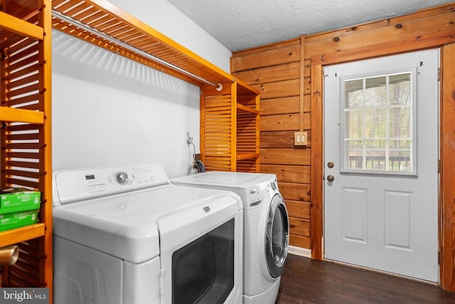 248 Wintergreen Dr, Luray, VA 22835 - laundry room with separate washer and dryer, wood walls, and dark wood-type flooring