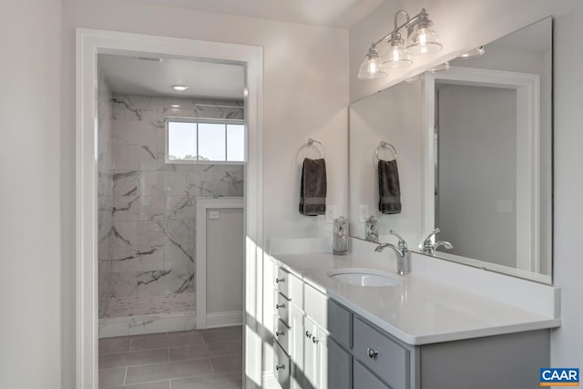 33 Ashlin Cv, Charlottesville, VA 22901 - bathroom featuring vanity, a marble finish shower, and visible vents
