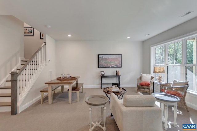 33 Ashlin Cv, Charlottesville, VA 22901 - living room featuring stairs, light colored carpet, visible vents, recessed lighting, and baseboards