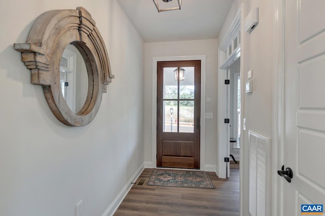 33 Ashlin Cv, Charlottesville, VA 22901 - doorway featuring baseboards and wood finished floors