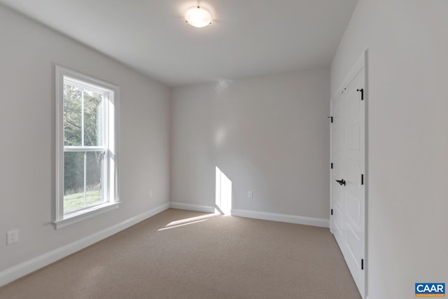 33 Ashlin Cv, Charlottesville, VA 22901 - carpeted spare room with baseboards