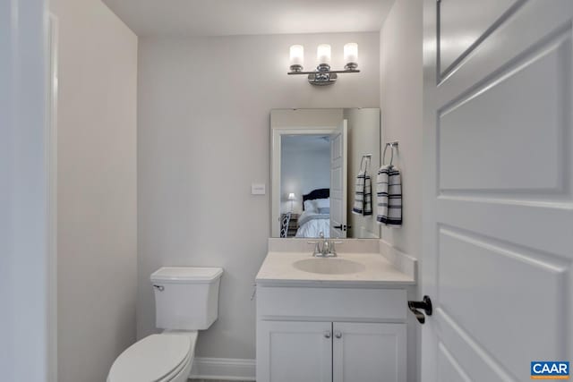 33 Ashlin Cv, Charlottesville, VA 22901 - ensuite bathroom with toilet, baseboards, ensuite bath, and vanity