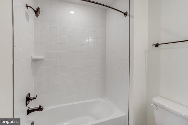 bathroom with toilet and shower / tub combination