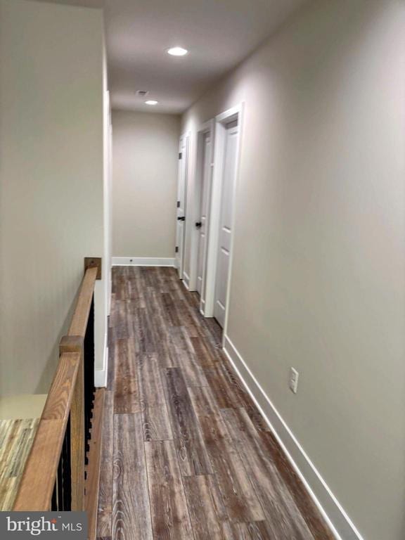406 Westover Pkwy, Locust Grove, VA 22508 - hallway with dark wood-style floors, an upstairs landing, baseboards, and recessed lighting
