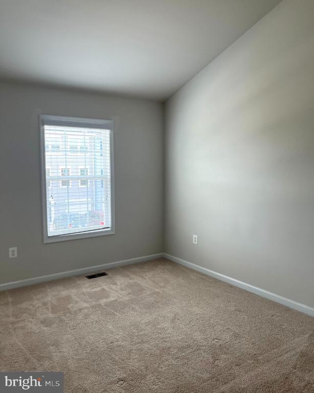 12112 Bowling Farm Ct, Fredericksburg, VA 22407 - carpeted spare room featuring baseboards