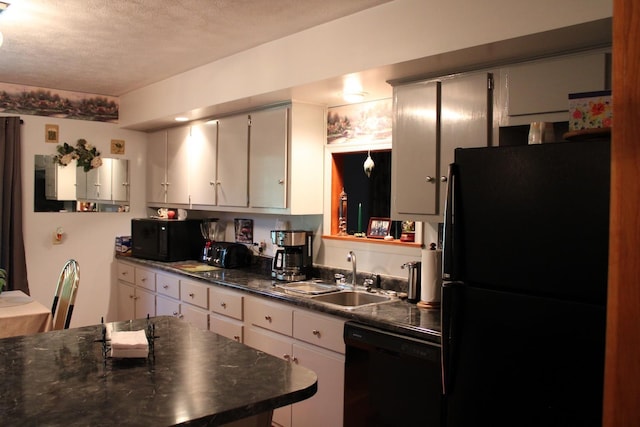 581 Oak Grove Church Rd, Waynesboro, VA 22980 - kitchen featuring black appliances, a sink, dark countertops, a textured ceiling, and white cabinetry