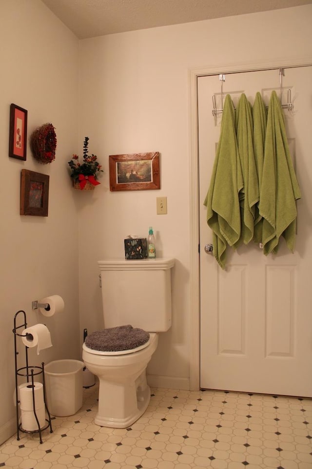 581 Oak Grove Church Rd, Waynesboro, VA 22980 - bathroom with toilet, baseboards, and tile patterned floors