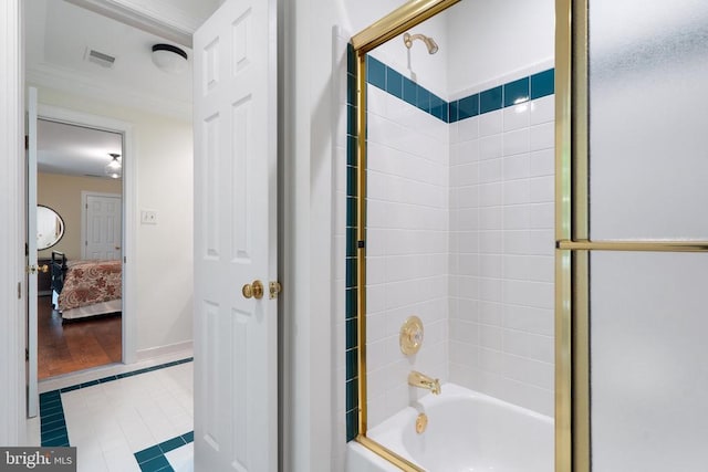  - ensuite bathroom featuring shower / tub combination, tile patterned flooring, and crown molding