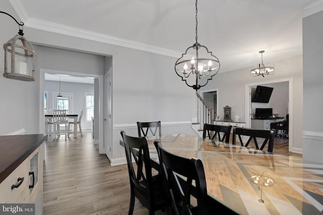 1909 Artillery Ridge Rd, Fredericksburg, VA 22408 - dining room with a chandelier, wood finished floors, crown molding, stairs, and baseboards