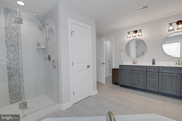 1909 Artillery Ridge Rd, Fredericksburg, VA 22408 - bathroom with a shower stall, double vanity, tile patterned flooring, and baseboards