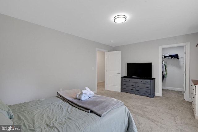 1909 Artillery Ridge Rd, Fredericksburg, VA 22408 - bedroom with carpet flooring, a walk in closet, baseboards, and a closet