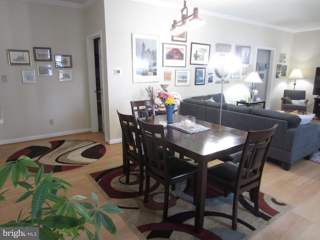 11200 Scottwood Ln N, Fredericksburg, VA 22407 - dining area featuring wood finished floors, crown molding, and baseboards