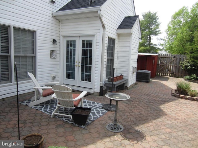 11200 Scottwood Ln N, Fredericksburg, VA 22407 - view of patio / terrace with french doors, cooling unit, and a gate