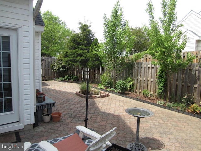 11200 Scottwood Ln N, Fredericksburg, VA 22407 - fenced backyard with a patio
