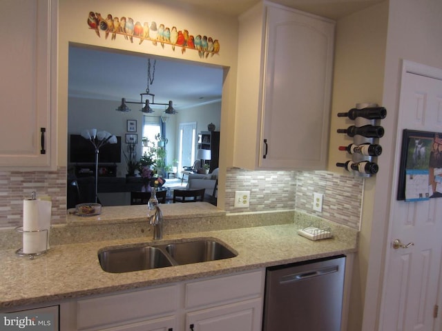 11200 Scottwood Ln N, Fredericksburg, VA 22407 - kitchen with dishwasher, a sink, white cabinetry, tasteful backsplash, and ornamental molding