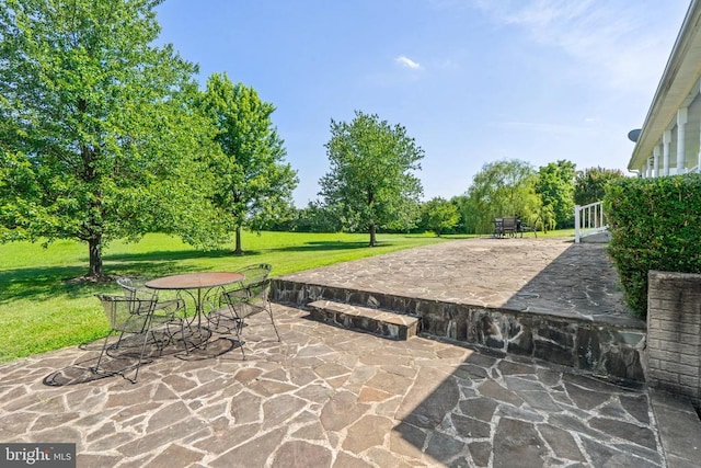  - view of patio featuring outdoor dining space