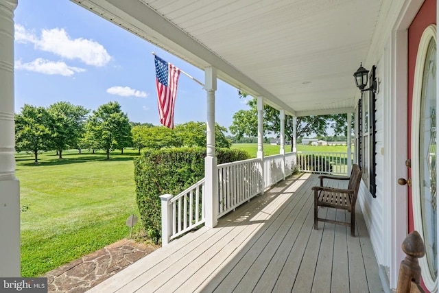  - wooden porch with a yard