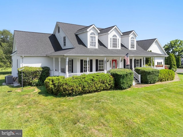  - cape cod house with covered porch, a front yard, and roof with shingles