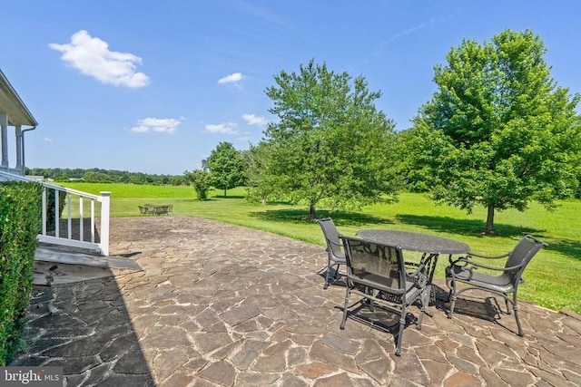  - view of patio / terrace featuring outdoor dining area