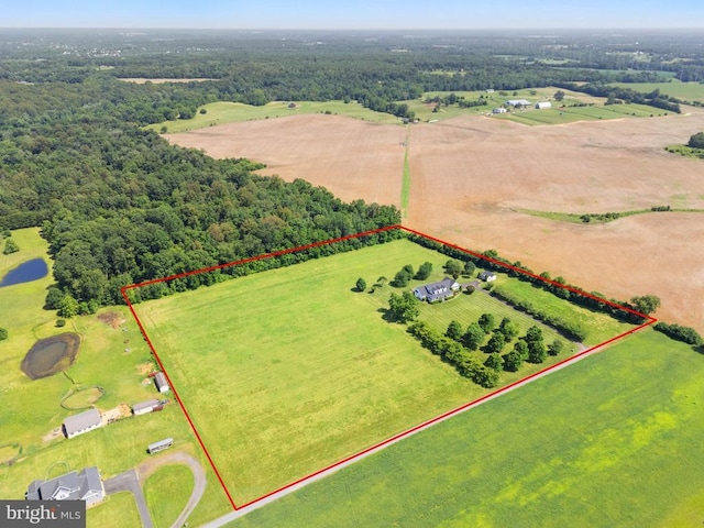  - aerial view of sparsely populated area with property parcel outlined