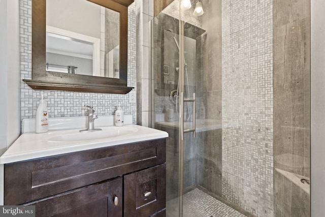  - full bathroom featuring vanity, a stall shower, and backsplash