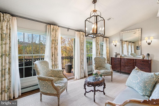 1126 F T Valley Rd, Sperryville, VA 22740 - living area with a chandelier, baseboard heating, lofted ceiling, and wood finished floors