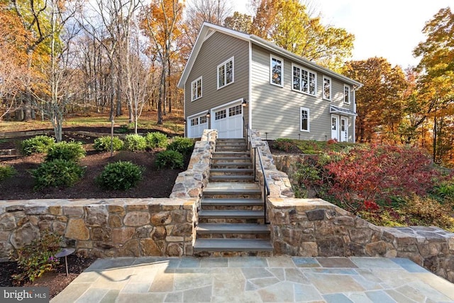 1126 F T Valley Rd, Sperryville, VA 22740 - view of front of home featuring stairway and a garage