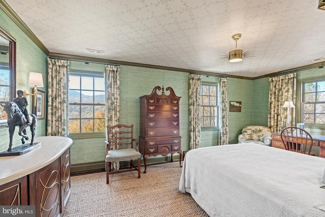 1126 F T Valley Rd, Sperryville, VA 22740 - bedroom with ornamental molding, wallpapered walls, light carpet, and a ceiling fan
