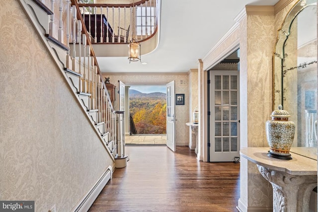 1126 F T Valley Rd, Sperryville, VA 22740 - entryway featuring wood finished floors, wallpapered walls, ornamental molding, stairs, and a baseboard heating unit