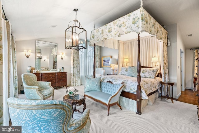 1126 F T Valley Rd, Sperryville, VA 22740 - bedroom with a chandelier, vaulted ceiling, carpet flooring, and baseboards