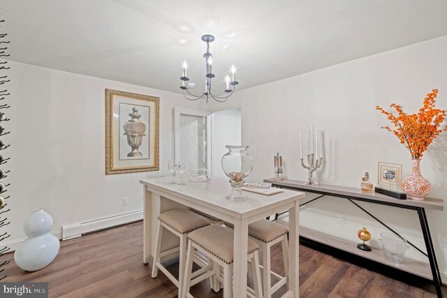 1126 F T Valley Rd, Sperryville, VA 22740 - dining area with a baseboard heating unit, a chandelier, wood finished floors, and baseboards