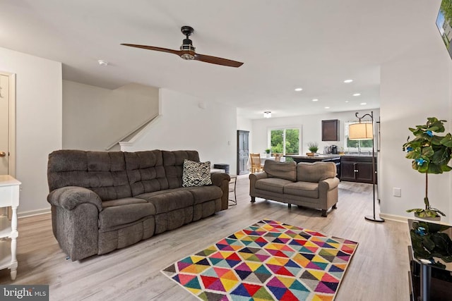 5014 Godwins Landing Dr, Remington, VA 22734 - living area with light wood-style flooring, ceiling fan, stairway, and recessed lighting