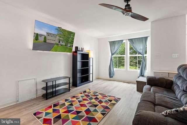 5014 Godwins Landing Dr, Remington, VA 22734 - living area with a ceiling fan and wood finished floors
