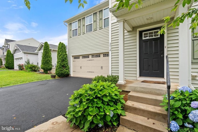 5014 Godwins Landing Dr, Remington, VA 22734 - doorway to property with an attached garage and asphalt driveway