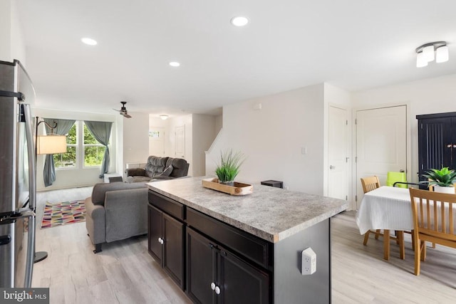 5014 Godwins Landing Dr, Remington, VA 22734 - kitchen featuring freestanding refrigerator, light wood finished floors, a ceiling fan, light countertops, and recessed lighting