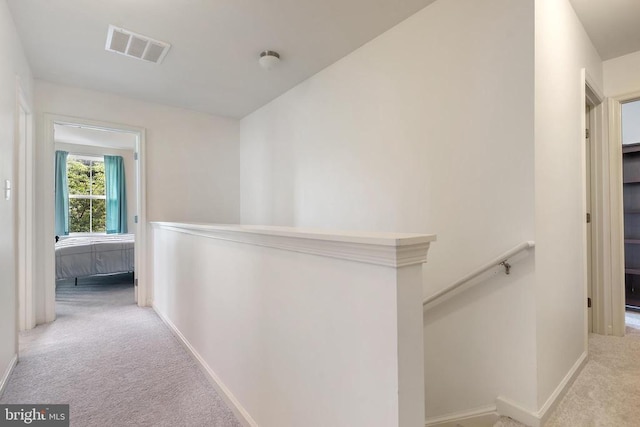 5014 Godwins Landing Dr, Remington, VA 22734 - hallway with an upstairs landing and carpet