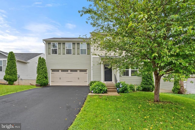 5014 Godwins Landing Dr, Remington, VA 22734 - view of front of property featuring asphalt driveway, an attached garage, and a front yard