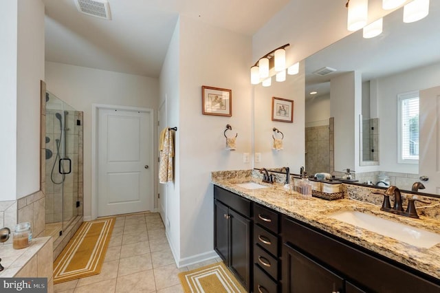 11726 Robin Woods Cir, Spotsylvania, VA 22551 - full bathroom featuring a shower stall, tile patterned flooring, baseboards, and double vanity