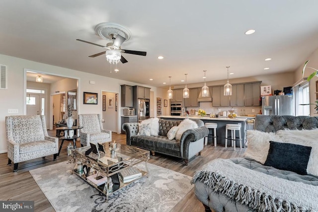 11726 Robin Woods Cir, Spotsylvania, VA 22551 - living area with ceiling fan, light wood finished floors, and recessed lighting