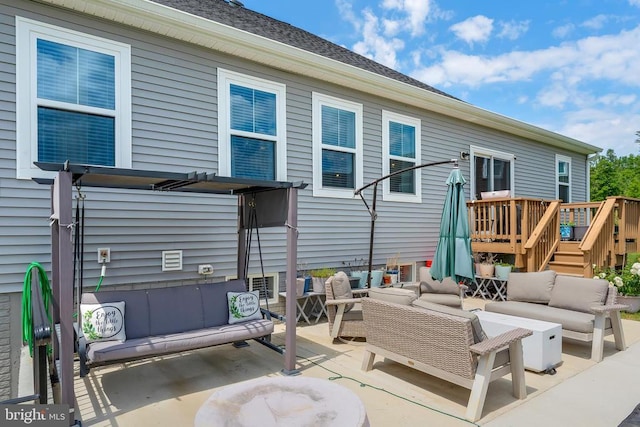11726 Robin Woods Cir, Spotsylvania, VA 22551 - back of property with an outdoor living space, a wooden deck, and a patio
