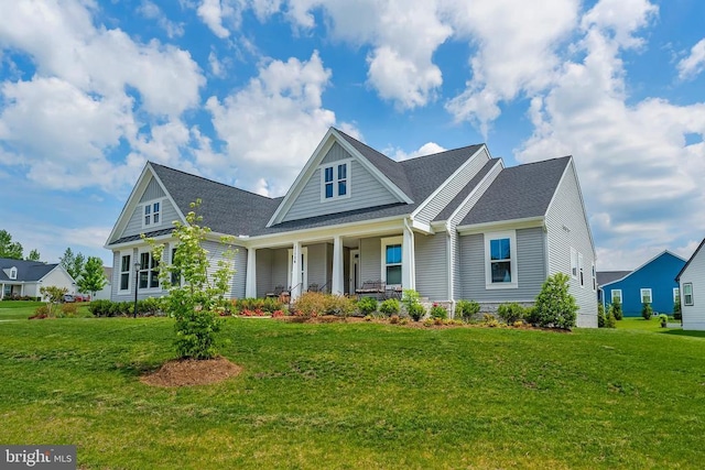 11726 Robin Woods Cir, Spotsylvania, VA 22551 - view of front of property featuring covered porch, a front yard, and a shingled roof