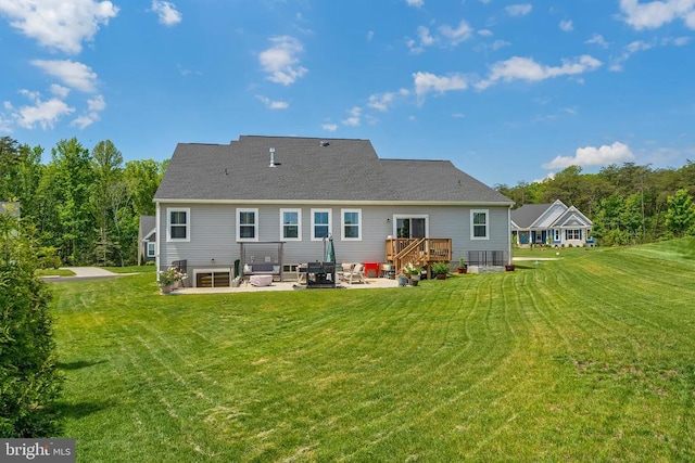 11726 Robin Woods Cir, Spotsylvania, VA 22551 - rear view of house featuring a patio, a lawn, and a wooden deck
