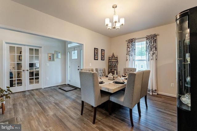 11726 Robin Woods Cir, Spotsylvania, VA 22551 - dining space featuring a chandelier, dark wood-type flooring, french doors, and baseboards
