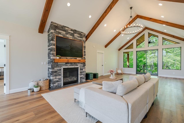 10 Samuel Bears Rd, Weyers Cave, VA 24486 - living area featuring a stone fireplace, beam ceiling, high vaulted ceiling, baseboards, and wood finished floors