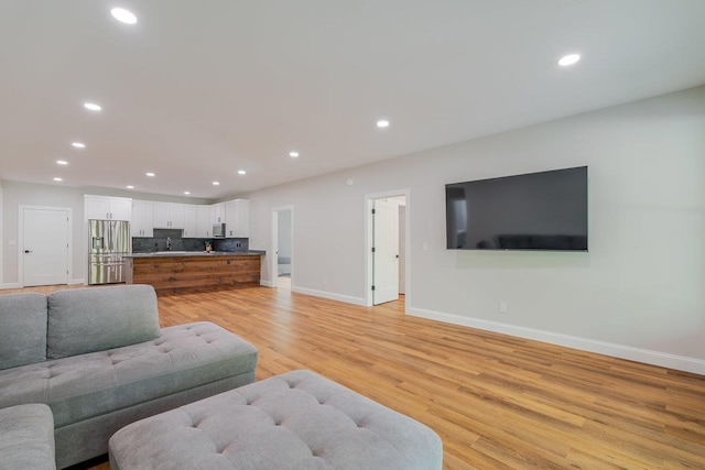 10 Samuel Bears Rd, Weyers Cave, VA 24486 - living room with baseboards, light wood-style floors, and recessed lighting