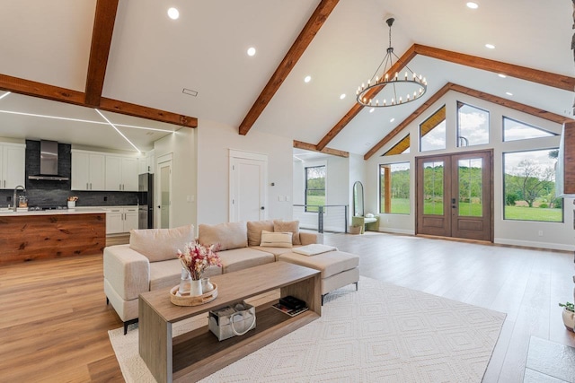 10 Samuel Bears Rd, Weyers Cave, VA 24486 - living room with high vaulted ceiling, recessed lighting, beamed ceiling, light wood-style flooring, and a chandelier
